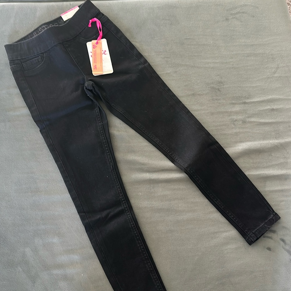 Girls size 7 slim Justice jeggings in black.